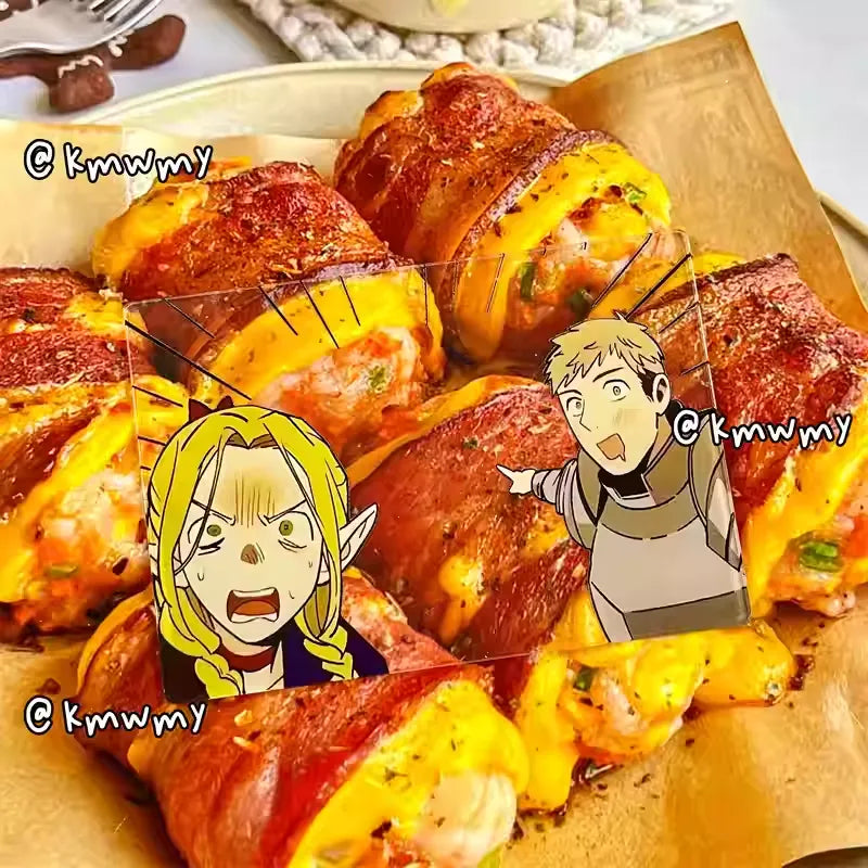 An acrylic transparent card featuring Delicious in Dungeon (Dungeon Meshi) characters Marcille and Laios in a playful food-themed scene. Marcille is wide-eyed with shock, while Laios grins excitedly, pointing to the center of the image with drool dripping from his mouth—as if spotting an irresistible meal. The card is propped against a backdrop of delicious real-world dish (e.g., a juicy steak or steaming stew), blending the anime’s fantasy hunger with mouthwatering reality. The translucent acrylic gives 
