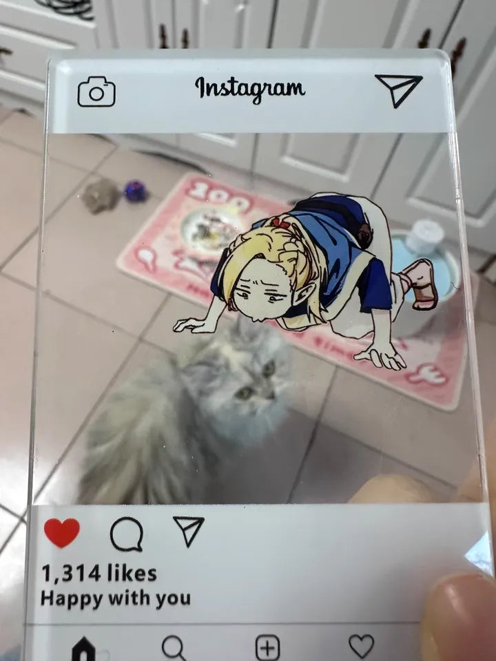 An acrylic transparent card featuring Delicious in Dungeon (Dungeon Meshi)'s Marcille in a comical pose—lying flat on the ground, desperately inhaling the scent of food with starry-eyed obsession. The card is playfully placed next to an aromatic dish (e.g., a sizzling steak or buttery pastry), creating the illusion that Marcille is literally fangirling over the meal. The translucent acrylic blends the artwork with the real food, enhancing the humor of her dramatic antics.